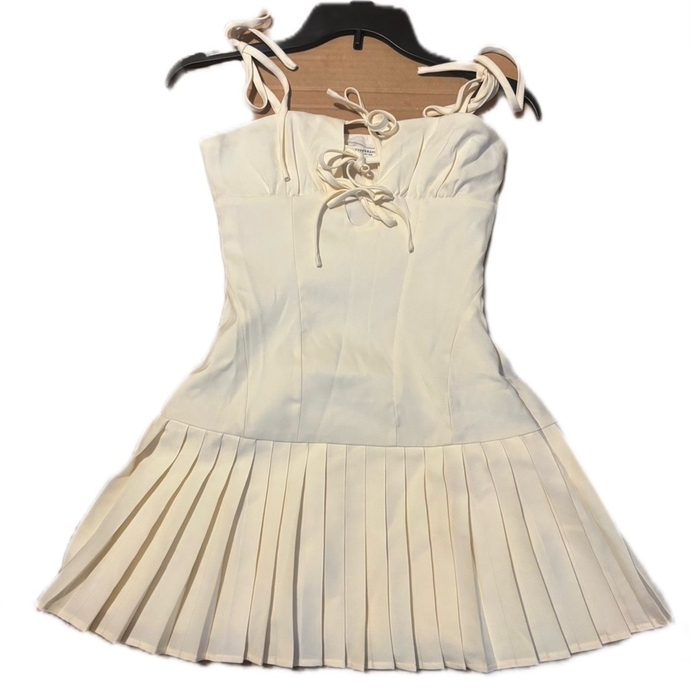 Chic Ivory Pleated Babydoll Dress
